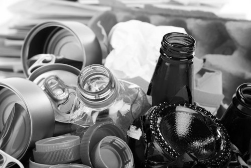 Vans and operatives outside an office for clearance in Kentish Town